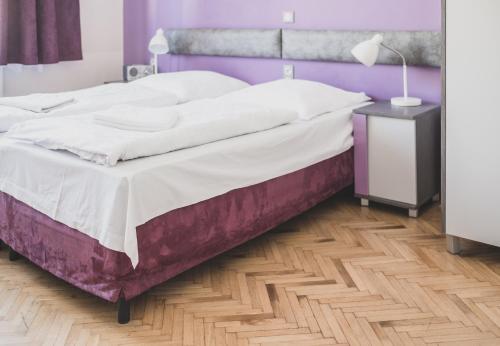 Cybulskiego Guest Roomsにあるベッド