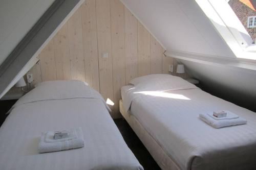 En eller flere senge i et værelse på Omas kleine huisje