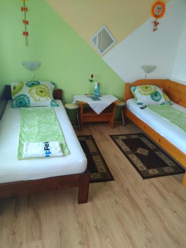 Katil atau katil-katil dalam bilik di Casa Tomson, free parking, aproape de natura