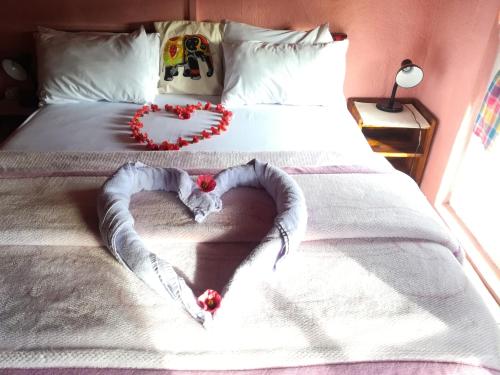 Postel nebo postele na pokoji v ubytování Sincere Wilderness Home stay