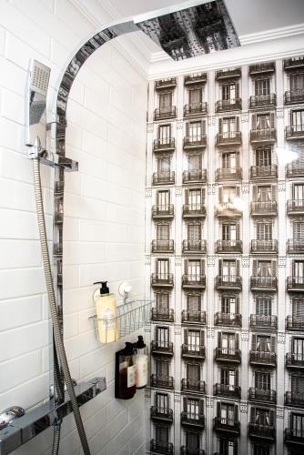a shower in a bathroom with a building at Willa Krakowska in Raszyn