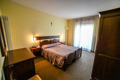 Postel nebo postele na pokoji v ubytování Hotel Monte Nebin