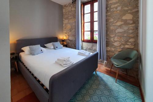 Una cama o camas en una habitación de Abitarela - Maison d'Hôtes - B&B