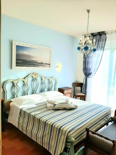 Postel nebo postele na pokoji v ubytování Bio Agriturismo Mare in Campagna