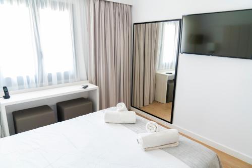 Ένα ή περισσότερα κρεβάτια σε δωμάτιο στο HOTEL SON VILAR