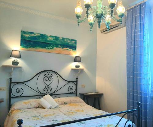 Postel nebo postele na pokoji v ubytování Bio Agriturismo Mare in Campagna