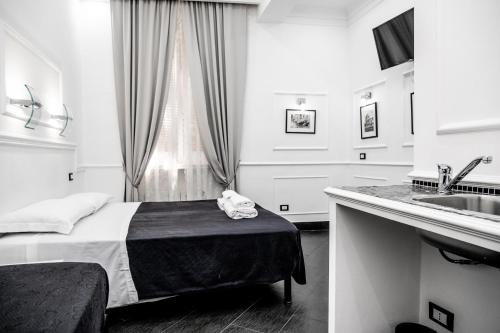 A bed or beds in a room at L'antica Locanda Dell'Orso