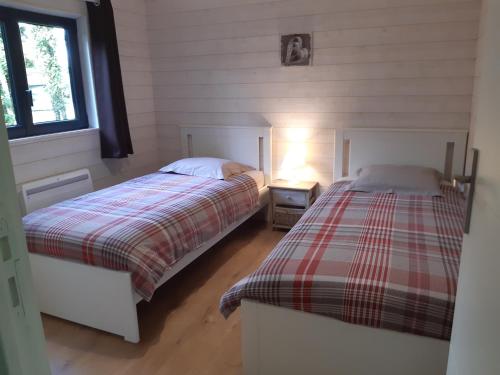 Postel nebo postele na pokoji v ubytování Gîte avec SPA privé près zoo Beauval et châteaux