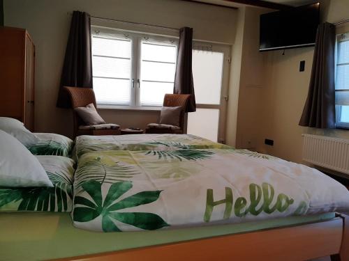 Ένα ή περισσότερα κρεβάτια σε δωμάτιο στο Appartement Merl