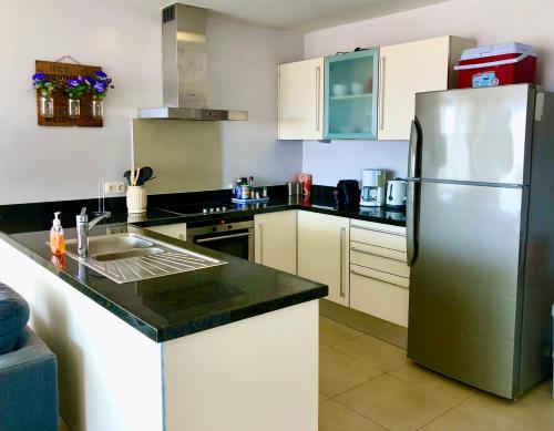 A cozinha ou cozinha compacta de Blue Bay Beach - Seaview Apartment - Blue Seas