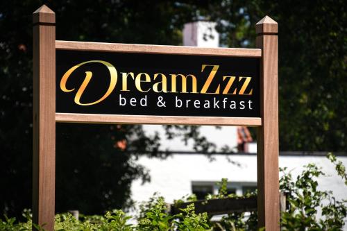 a sign that reads dreamzilla bed and breakfast at DreamZzz Boutique B&B Kaatsheuvel in Kaatsheuvel