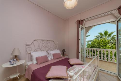 Postel nebo postele na pokoji v ubytování Luna Apartments