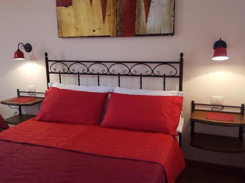 Una cama o camas en una habitación de Poggiofelice B&B