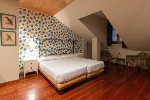 מיטה או מיטות בחדר ב-Hotel Casa Miño