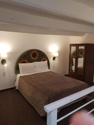 Postel nebo postele na pokoji v ubytování Hotel Meson Mariano Matamoros