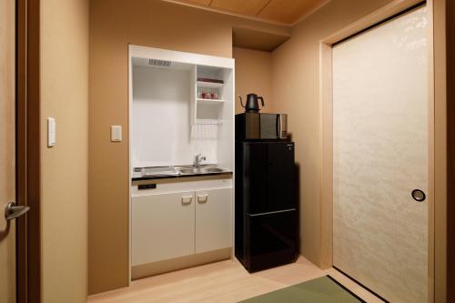 Kuchyň nebo kuchyňský kout v ubytování Connect inn Gion-Shijo
