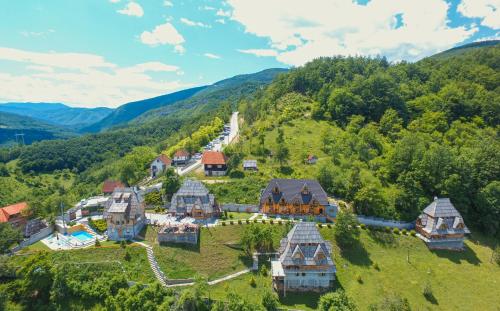 an aerial view of a house in the mountains at Neva Apartments in Mokra Gora