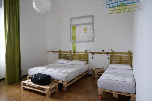 Una cama o camas en una habitación de House Sud Est