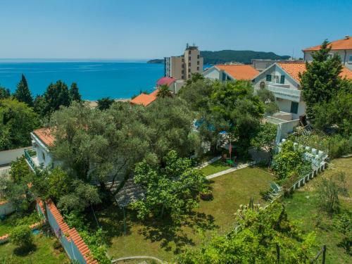 an aerial view of a city with the ocean at The Turtles Garden in Becici
