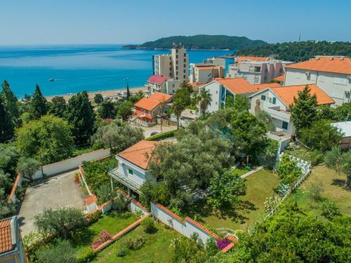 an aerial view of a town with a body of water at The Turtles Garden in Becici