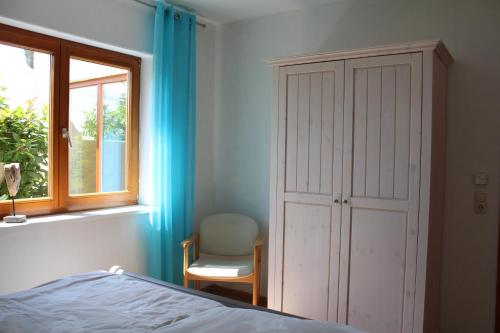 En eller flere senge i et værelse på Ferienwohnung Michelle