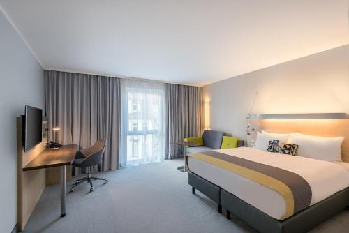 Holiday Inn Express Gütersloh, an IHG Hotelにあるベッド