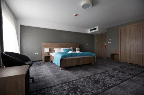 מיטה או מיטות בחדר ב-Hotel Porto