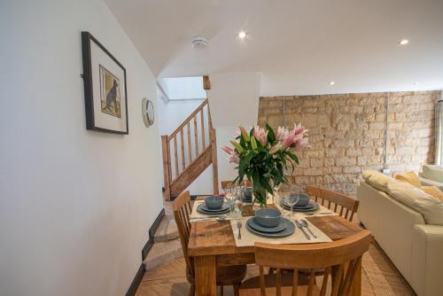 Χώρος καθιστικού στο Stainsborough Hall Holiday Cottages