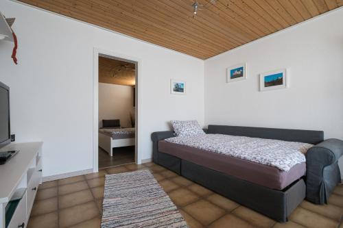 Ένα ή περισσότερα κρεβάτια σε δωμάτιο στο Ina's Ferienwohnung
