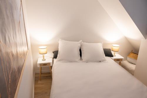 Ένα ή περισσότερα κρεβάτια σε δωμάτιο στο Appartement à Vienne