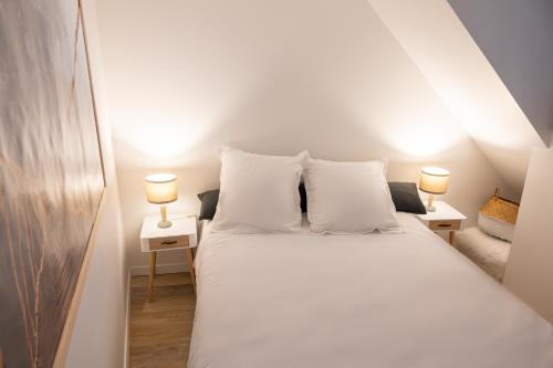 Katil atau katil-katil dalam bilik di Appartement à Vienne