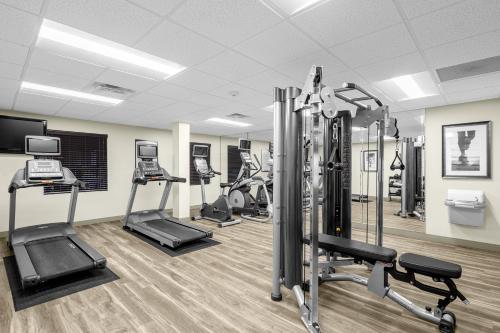 a gym with treadmills and elliptical machines at Staybridge Suites Chattanooga-Hamilton Place by IHG in Chattanooga