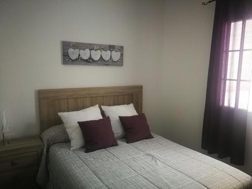 アリナガにあるResidencial Islasのベッドルーム1室(ベッド1台、枕2つ付)