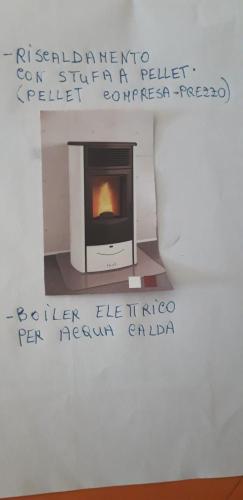 - une photo de cheminée dans la chambre dans l'établissement Le betulle - 022147-AT-050930, à Predazzo