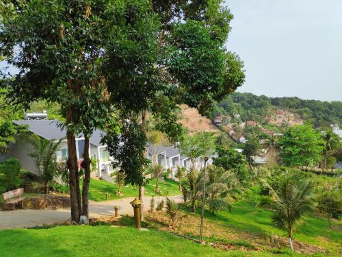 a view of a park with trees and houses at BIỂN ĐỒI Bungalow in Phu Quoc