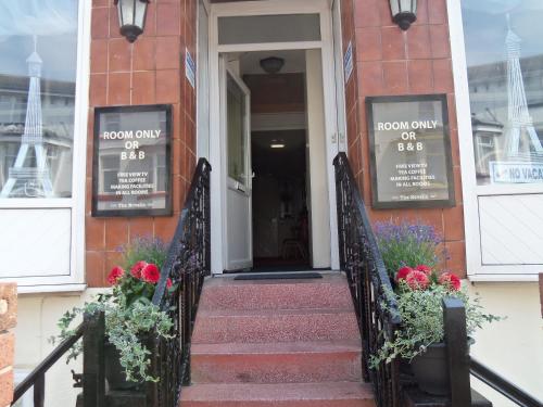 a stairway leading to the front door of a building at Novello Blackpool in Blackpool