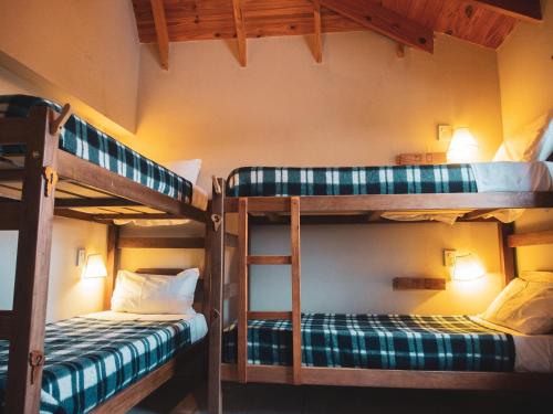Letto o letti in una camera di America Del Sur Calafate Hostel
