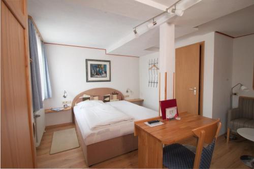 Een bed of bedden in een kamer bij Hotel Venezia