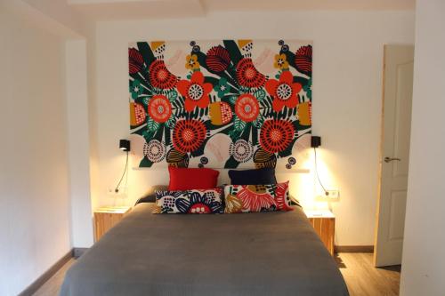 Postelja oz. postelje v sobi nastanitve Apartament Vall de Montserrat