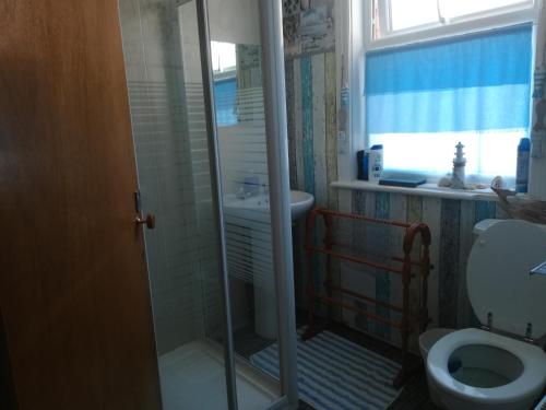 Ένα μπάνιο στο Schofield Guest House