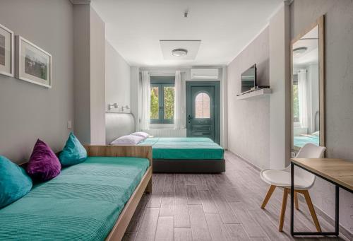 מיטה או מיטות בחדר ב-River Side Rooms