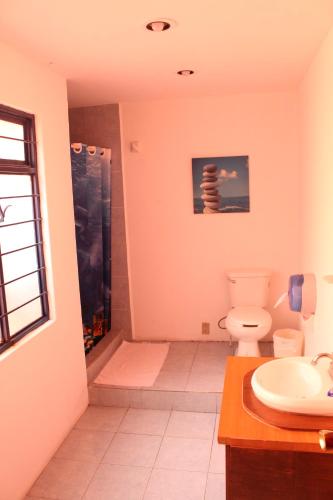 Kylpyhuone majoituspaikassa Hostal La Encantada