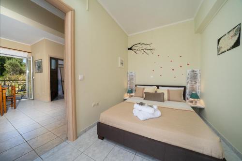 Postel nebo postele na pokoji v ubytování Casa di Colona - Μπεζ