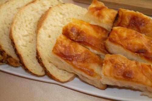 two slices of bread on a white plate at Hotel Living in Šuto Orizari