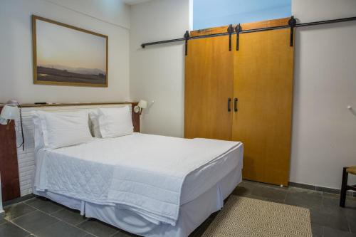 Postel nebo postele na pokoji v ubytování Hotel Fazenda Sete Lagos