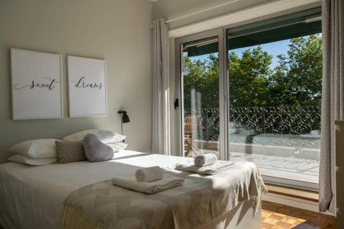 Postel nebo postele na pokoji v ubytování Virtudes Terrace