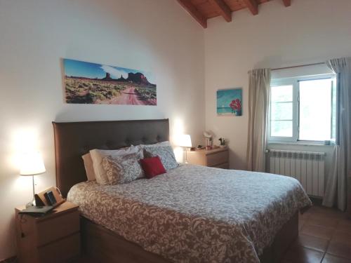 Ένα ή περισσότερα κρεβάτια σε δωμάτιο στο Casa Guna