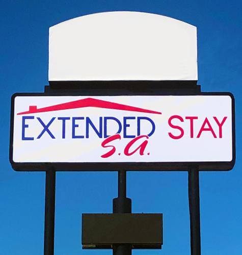 Extended Stay SAに飾ってある許可証、賞状、看板またはその他の書類
