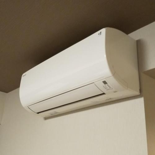 a white printer sitting on top of a table at Hotel Route-Inn Kawaguchiko in Fujikawaguchiko