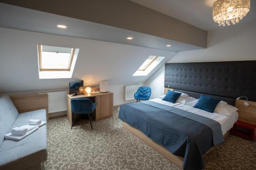 מיטה או מיטות בחדר ב-Átrium Rooms & Café